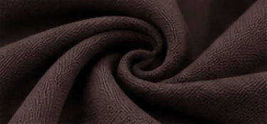 Swirl of dark brown recycled nylon